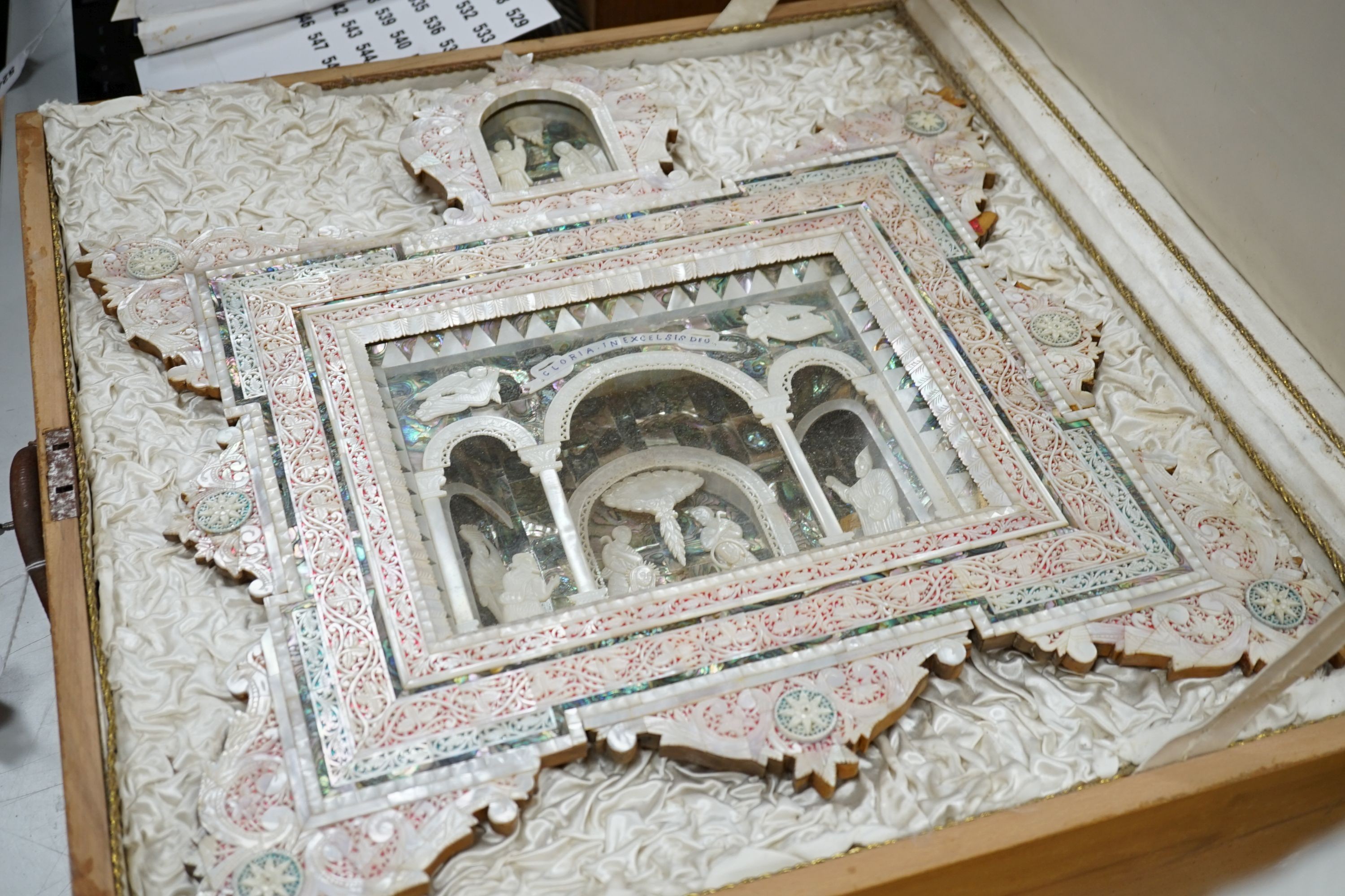 A mid 20th century mother-of-pearl and abalone easel shrine presented by the President of the Senate of Jordan